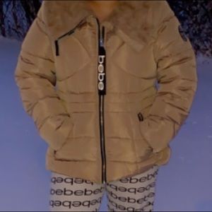 Cozy and warm winter zipper jacket with a hood. Full faux fur lining